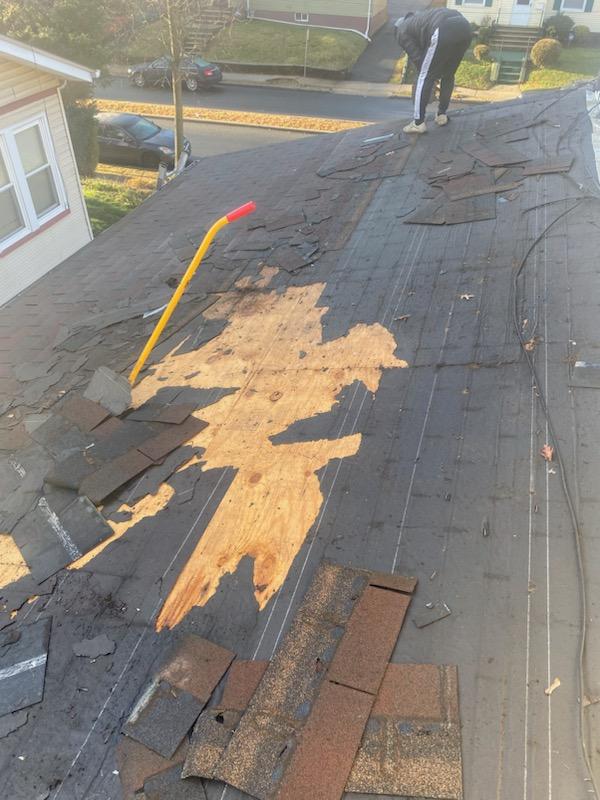 Roof Shingle Tear-Off in Progress