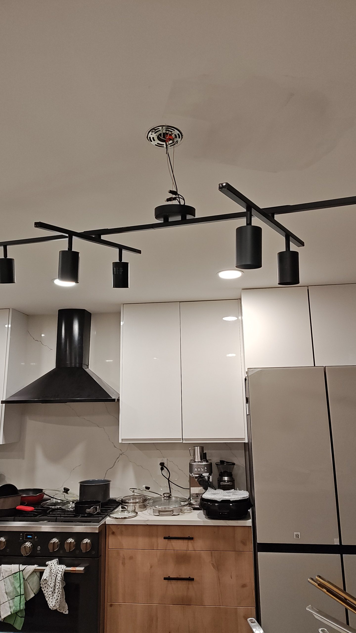 Kitchen Track Lighting and White Cabinets